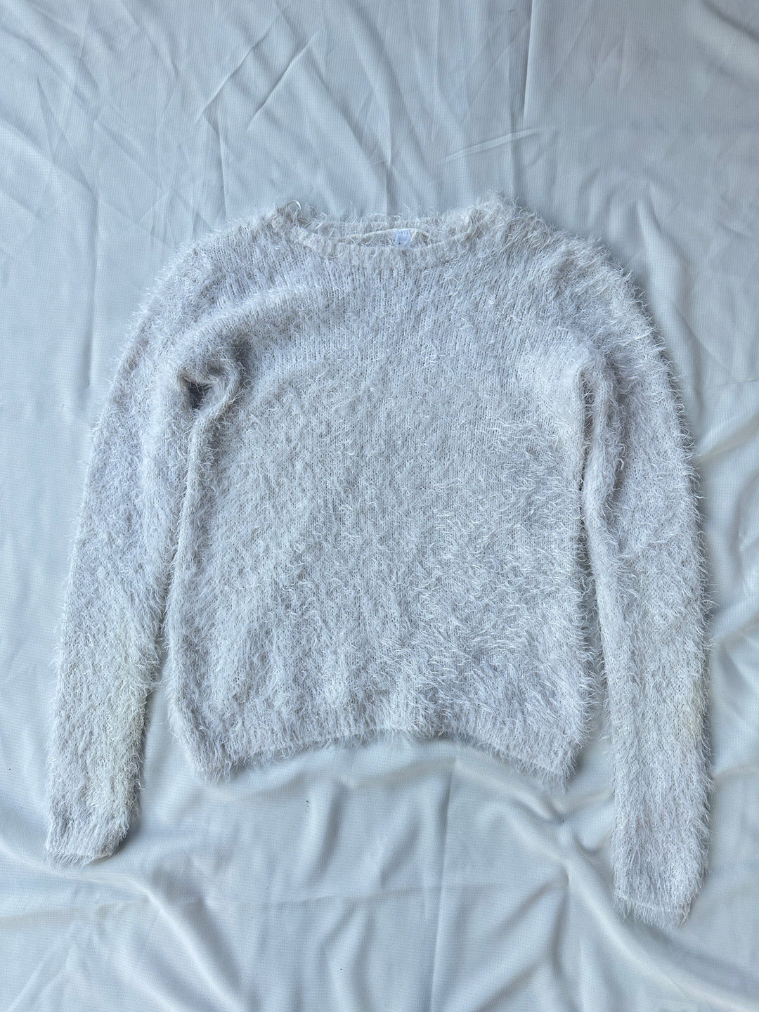 Image of white sweater