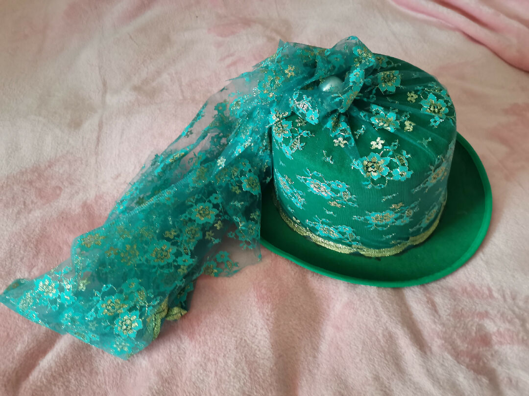 Green lace covered hat