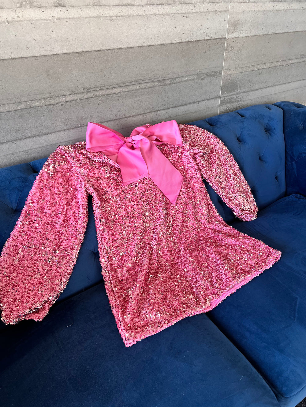 Image of Sequin dress with a bow