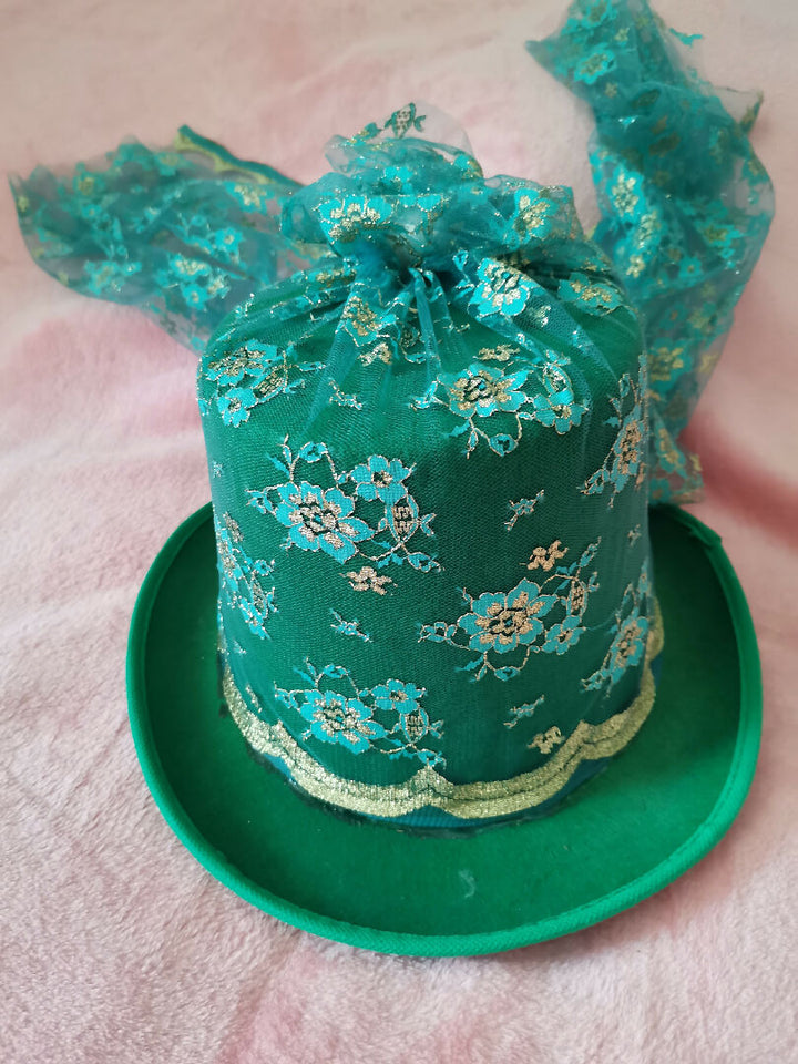 Green lace covered hat