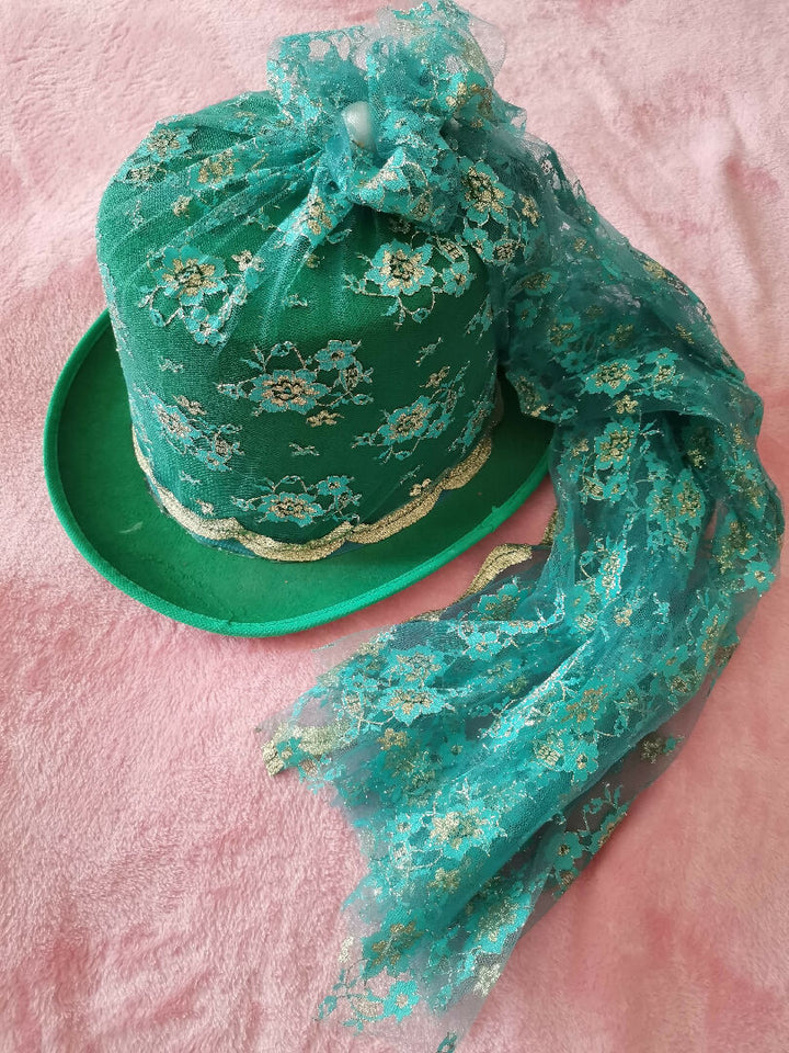 Green lace covered hat