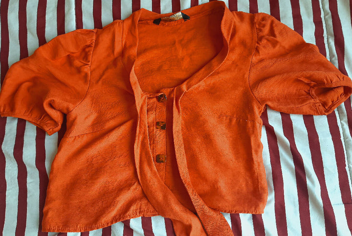 An orange two-piece