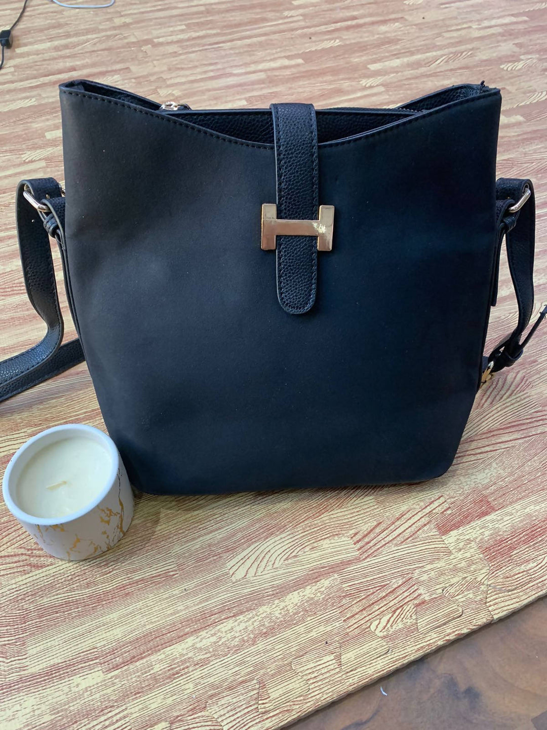 Image of Black Sling Bag With Gold Clip