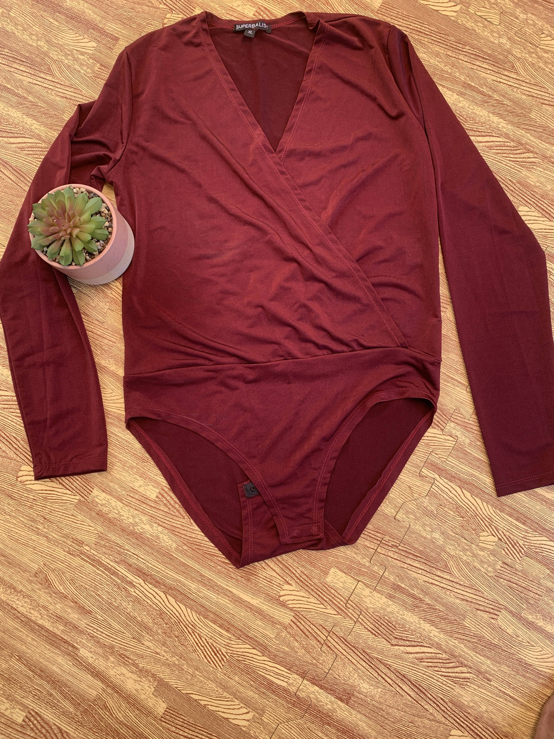 Image of Burgundy Silky Low Cut Bodysuit